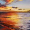 An original oil painting of a sunset on the Indian Ocean