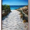 An original framed oil painting of a pathway down to a beach on the Indian ocean
