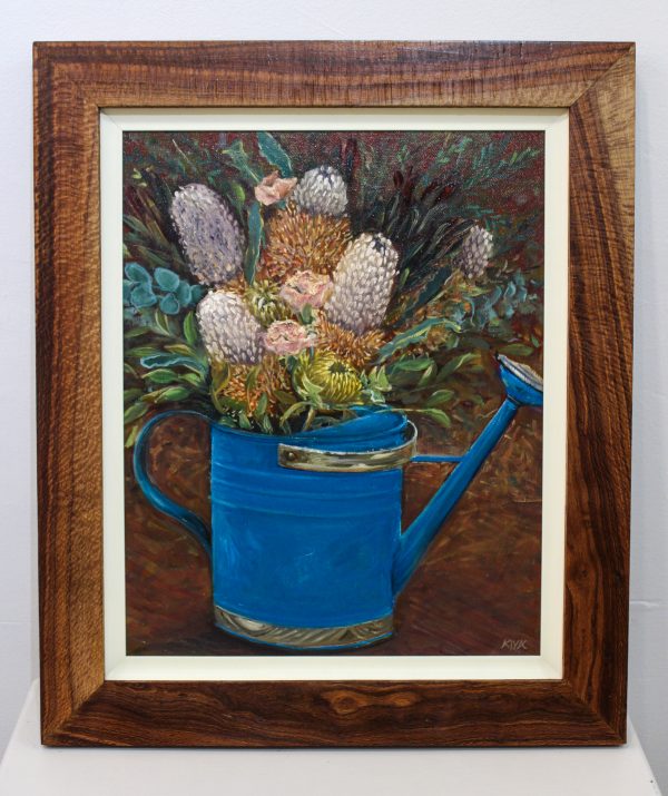 An original oil painting by Western Australian Artist Kiya Kalem depicting a bunch of Banksia blooms in a blue watering can