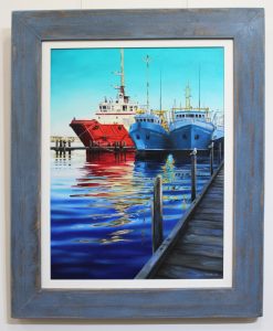 An original painting by Western Australian Artist Ben Sherar depicting brightly coloured fishing trawlers in a harbour