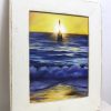 A framed original oil painting depicting a sunset at Perths popular Cottesloe beach